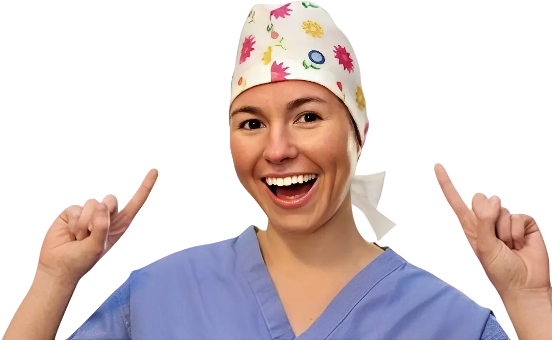 Smiling female healthcare worker in scrubs and a colorful scrub cap.