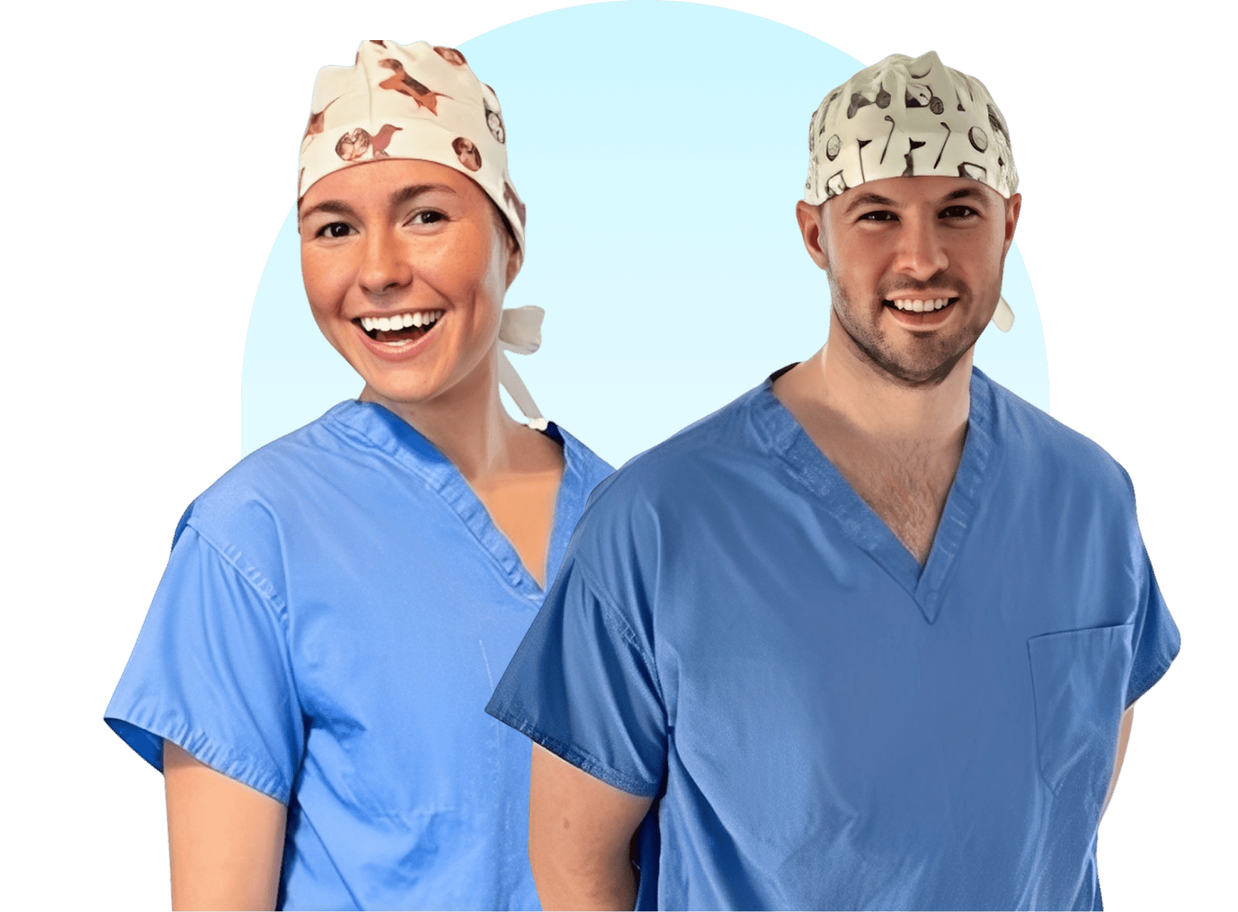 Two medical professionals in colorful surgical caps and scrubs smiling.